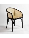 Fauteuil en rotin et grille noire