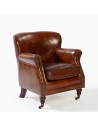 Brown aged leather armchair