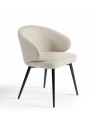 Sand-colored upholstered chair with black metal legs