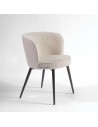 Rounded sand and black metal upholstered chair